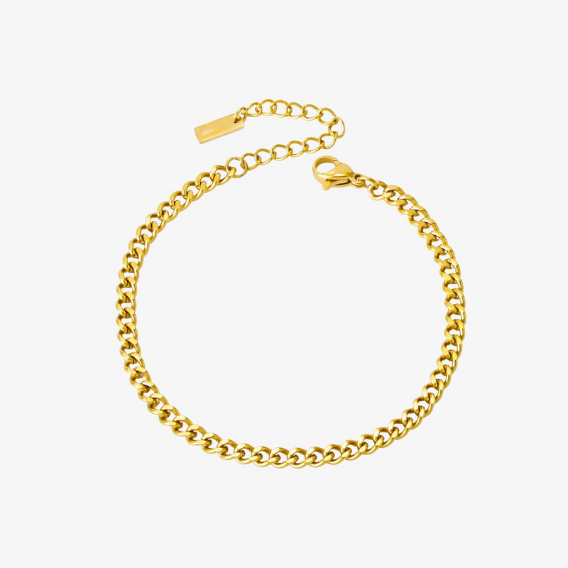 a gold chain bracelet on a white background