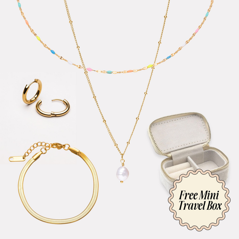 a necklace, earring, and ring with a free travel box