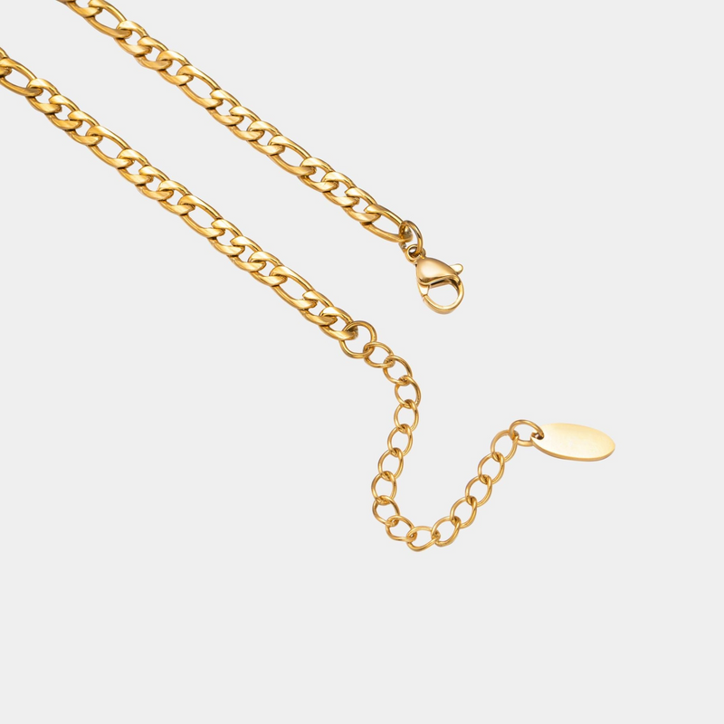 a gold chain is shown on a white background