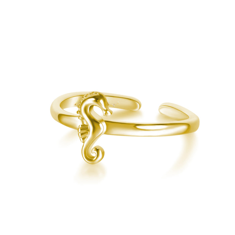 a gold ring with a lizard on it