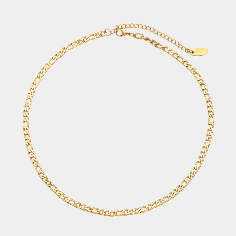 a gold chain bracelet on a white background