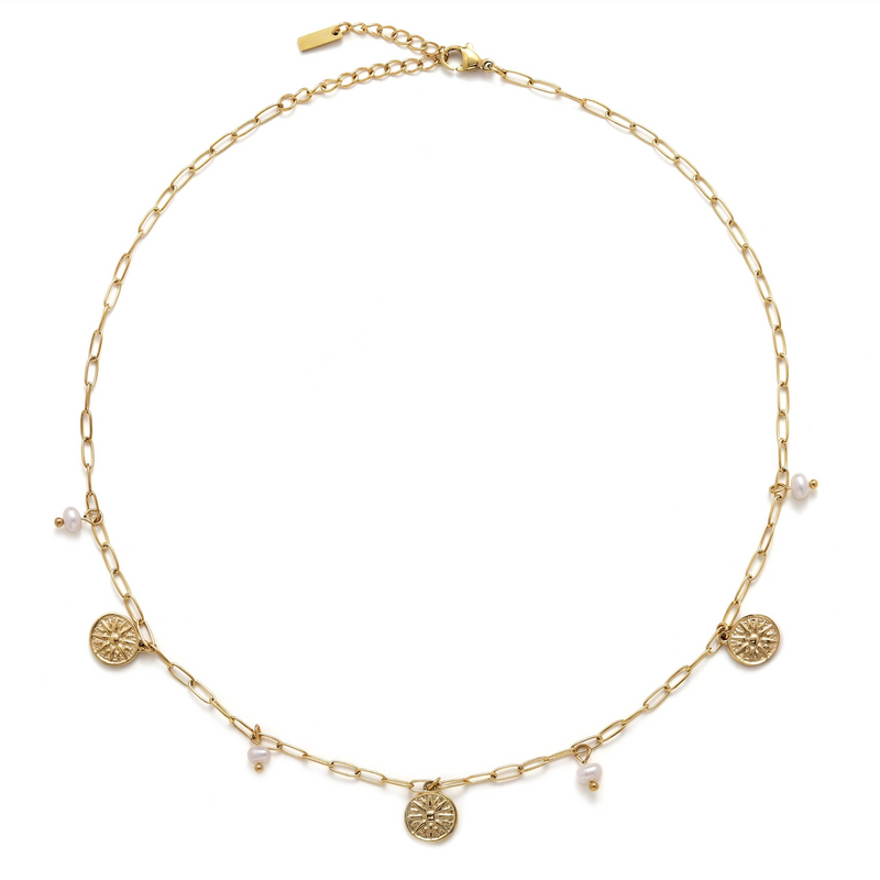 a gold necklace with four charms on it