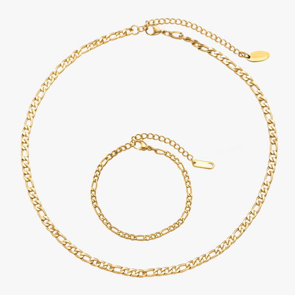 a gold chain with a clasp on a white background