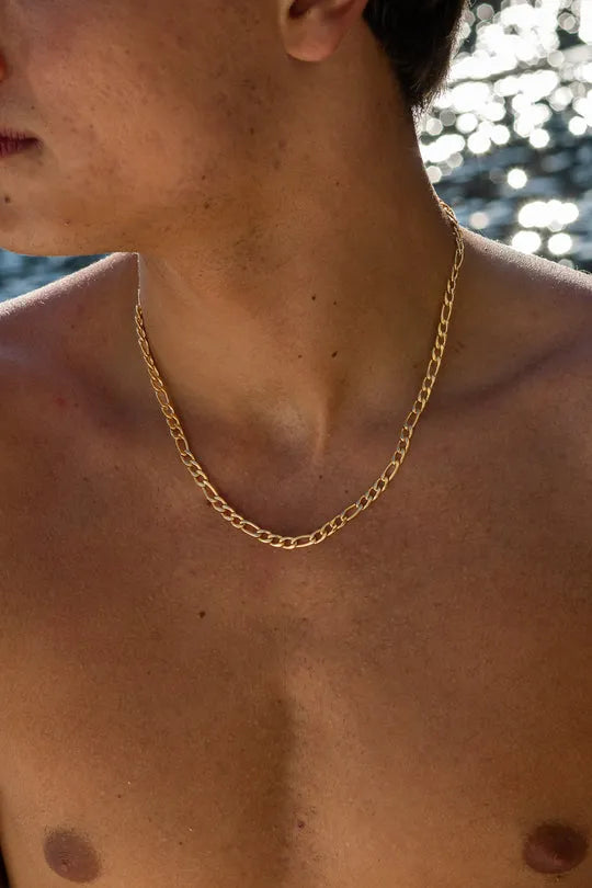 a close up of a person wearing a necklace