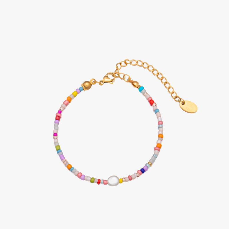 a bracelet with multicolored beads and a gold charm