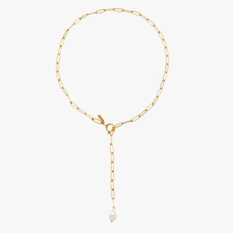 a gold chain necklace with a white pearl hanging from it