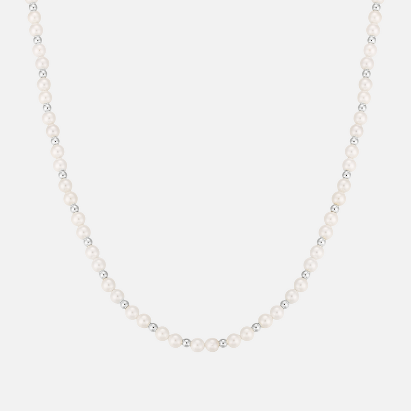 a white pearl necklace on a white background