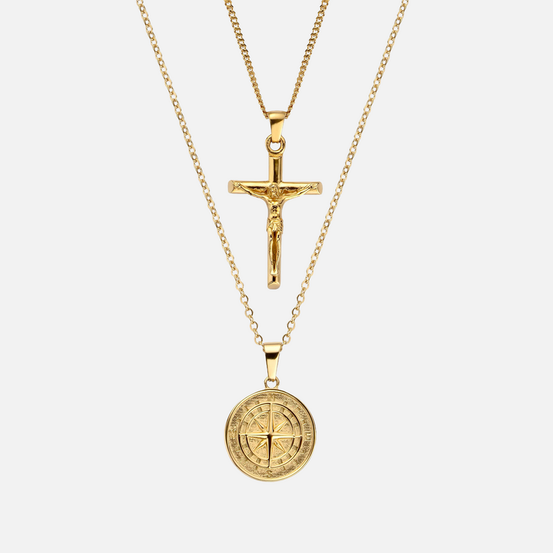 two necklaces with a cross and a coin