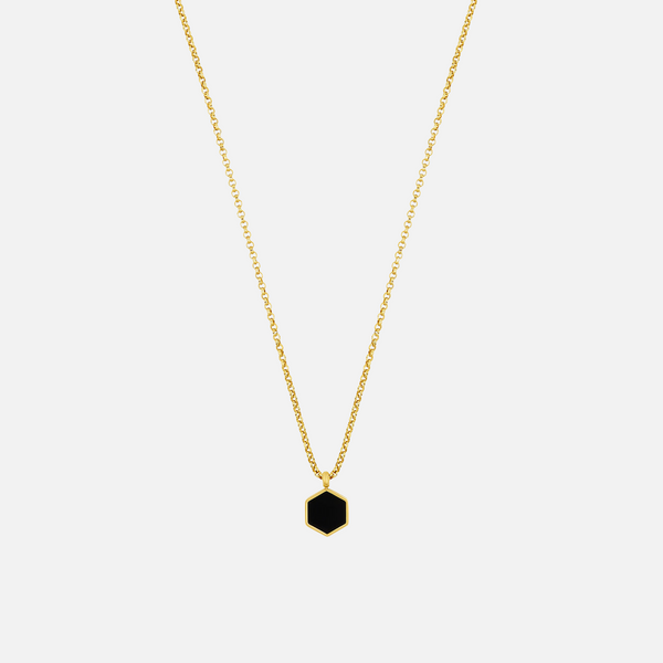 a gold necklace with a black diamond on it