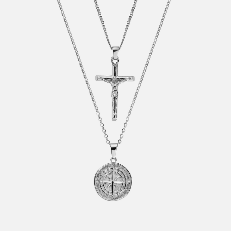 two necklaces with a cross and a coin