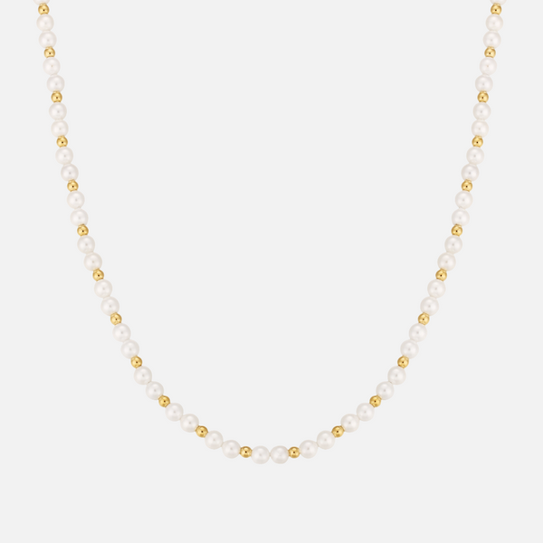 a necklace with pearls and gold beads